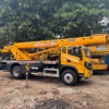 Armada crane PT Asanindo Jaya Abadi — unit XCMG XCT8 dan KATO siap di pool untuk rental crane di kawasan Cakung dan Jakarta Timur